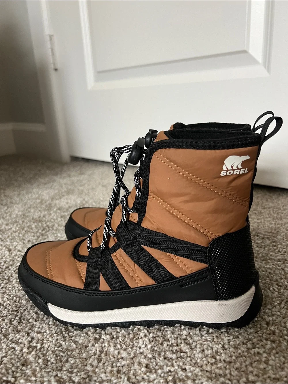 Sorel Tan and Black Insulated Winter Boots